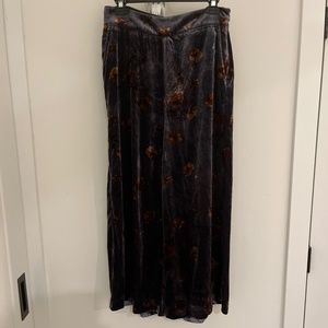 Velvet Grayish purple loosely fitted  pants with orange flowers on them